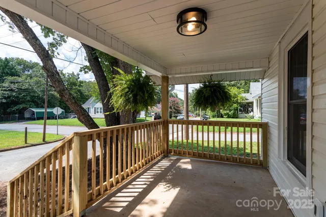a view of a porch with a yard