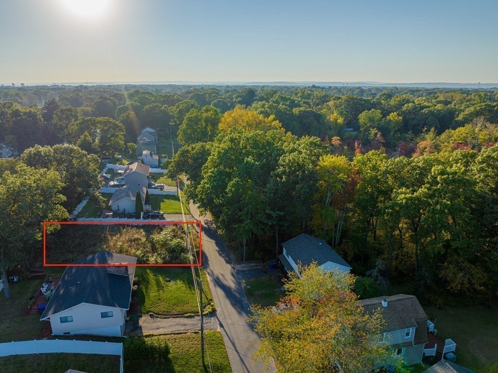 0 Woodrow Street Springfield, MA 01119 - Photo 4 of 6 an aerial view of a houses with a yard