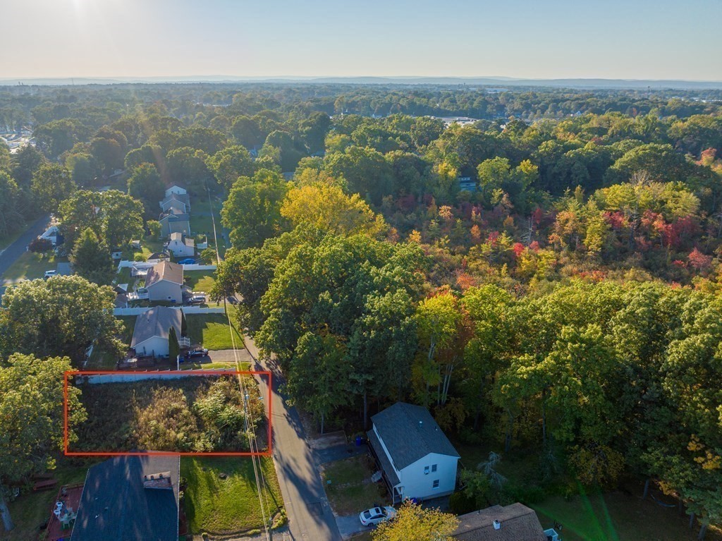 0 Woodrow Street Springfield, MA 01119 - Photo 5 of 6 an aerial view of lake and residential houses with outdoor space