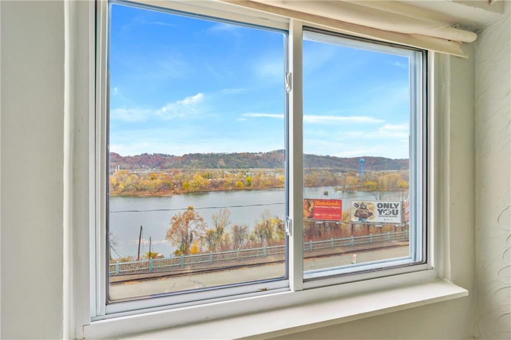 6824 Butler Street Pittsburgh, PA 15206 - Photo 14 of 26 a view of a glass door and a window