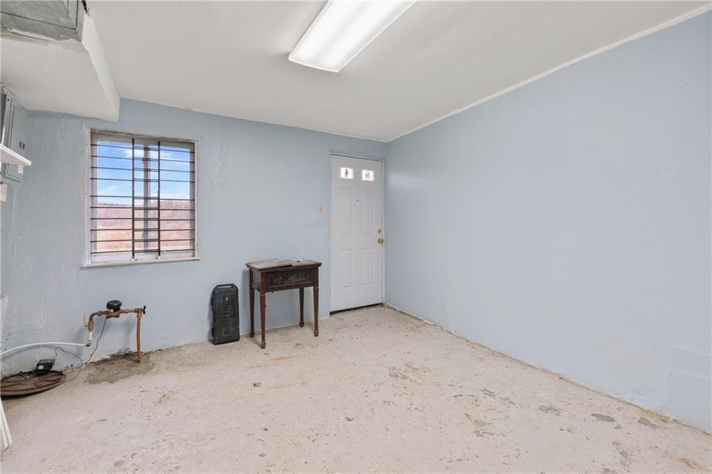 6824 Butler Street Pittsburgh, PA 15206 - Photo 21 of 26 a view of workspace with furniture and windows