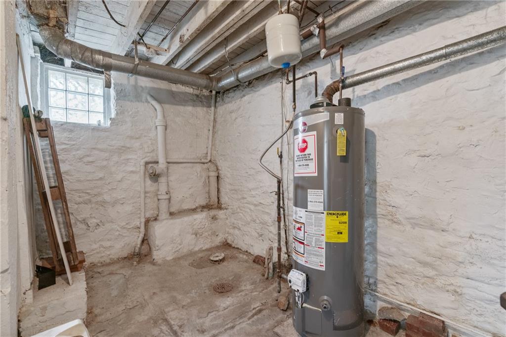 6824 Butler Street Pittsburgh, PA 15206 - Photo 22 of 26 a bathroom with a shower