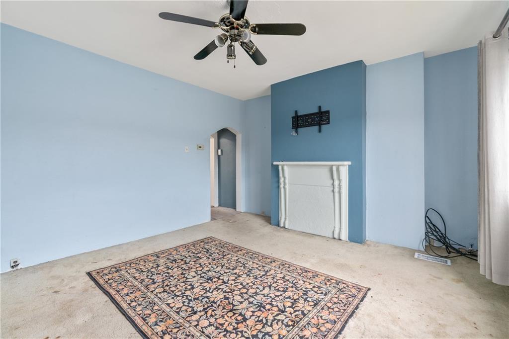 6824 Butler Street Pittsburgh, PA 15206 - Photo 5 of 26 a view of a hallway with a workspace