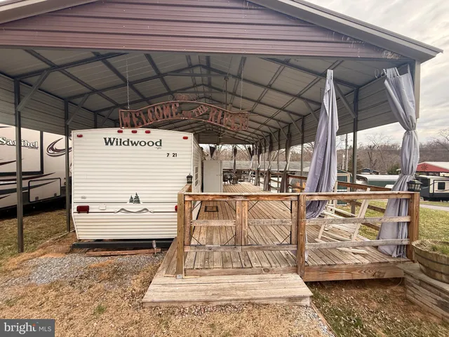 a view of a white house with a outdoor view