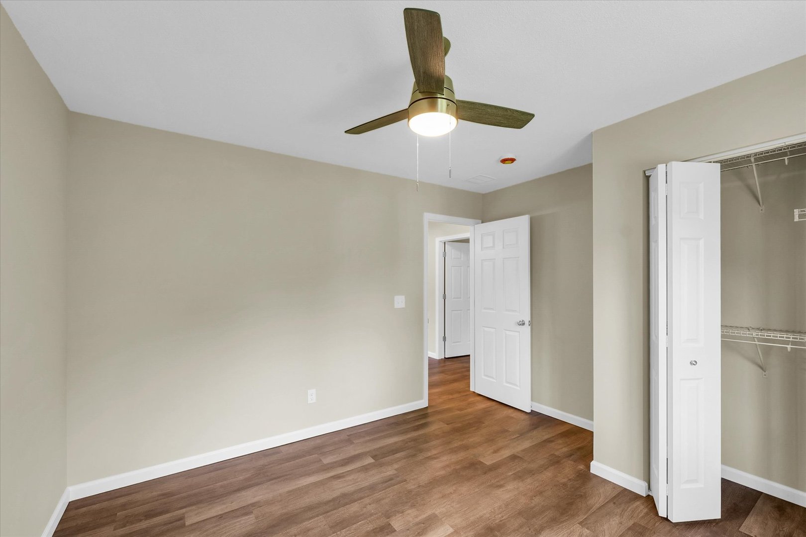 5 Montclair Road, Unit A Urbana, IL 61801 - Photo 22 of 33 a view of an empty room and window