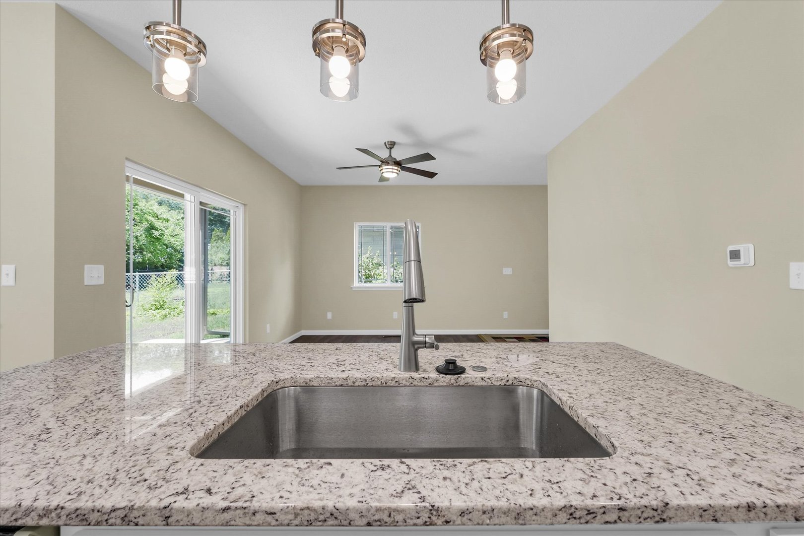 5 Montclair Road, Unit A Urbana, IL 61801 - Photo 29 of 33 a view of kitchen sink a faucet chandelier and wooden floor