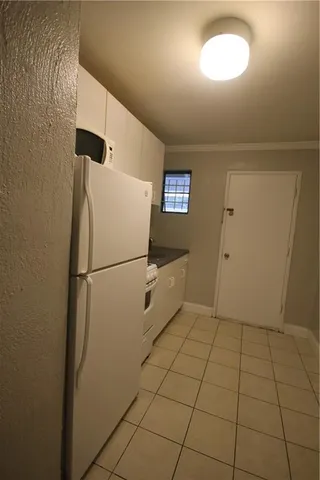 a bathroom with a toilet and shower