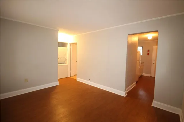 a kitchen with a sink a stove a refrigerator and a window