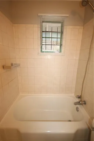 a white refrigerator freezer sitting inside of a kitchen