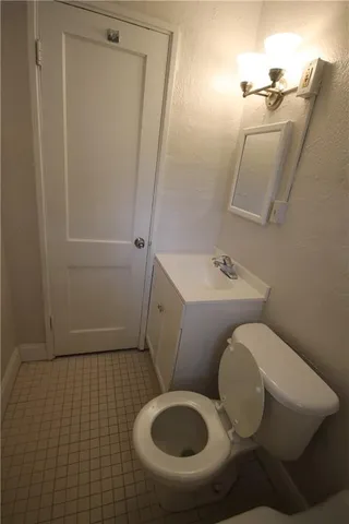 a bathroom with a sink a toilet and a bathtub