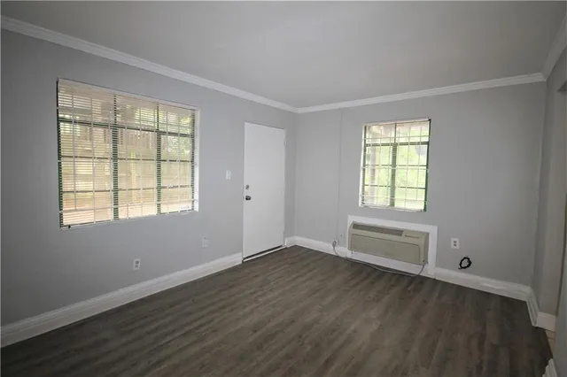 a bathroom with a sink a mirror and vanity