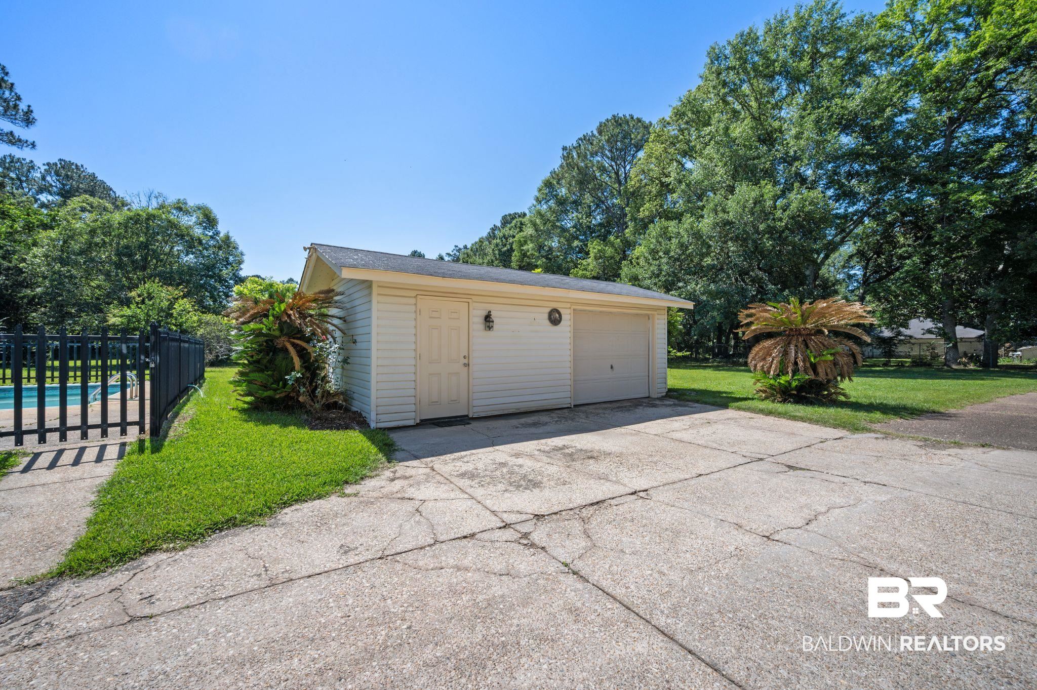 950 Walter Smith Road Mobile, AL 36695 - Photo 33 of 51 Detached garage with concrete driveway