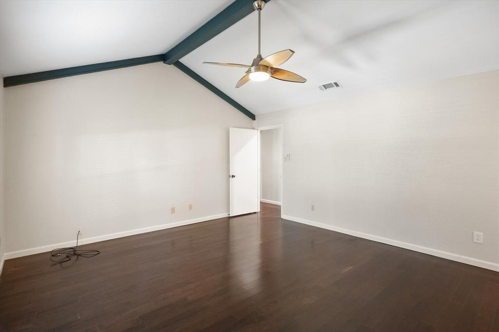 2003 Botts Drive Arlington, TX 76012 - Photo 23 of 40 a view of a small space with wooden floor and a ceiling fan