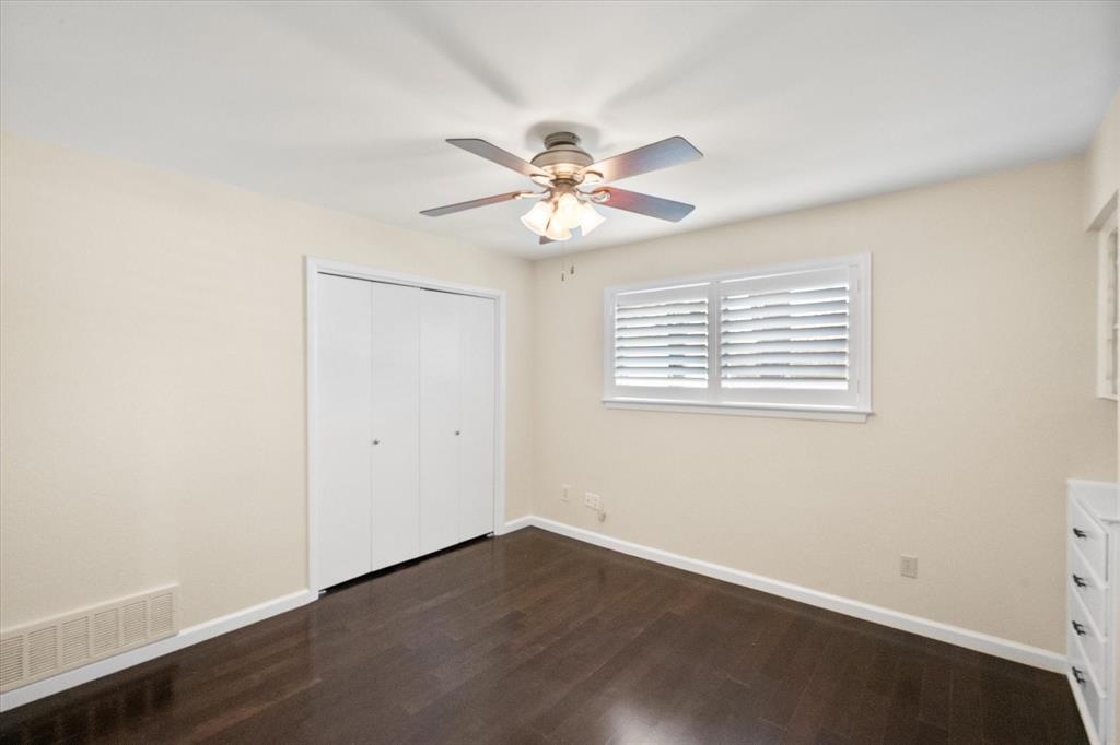 2003 Botts Drive Arlington, TX 76012 - Photo 27 of 40 an empty room with a window and a fan