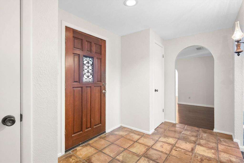 2003 Botts Drive Arlington, TX 76012 - Photo 4 of 40 a view of a hallway
