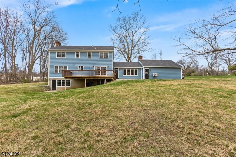 58 Andover Road Sparta, NJ 07871 - Photo 33 of 38 a view of a house with a yard and sitting area
