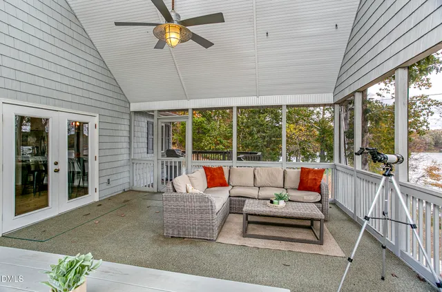 a view of deck with wooden floor and seating space