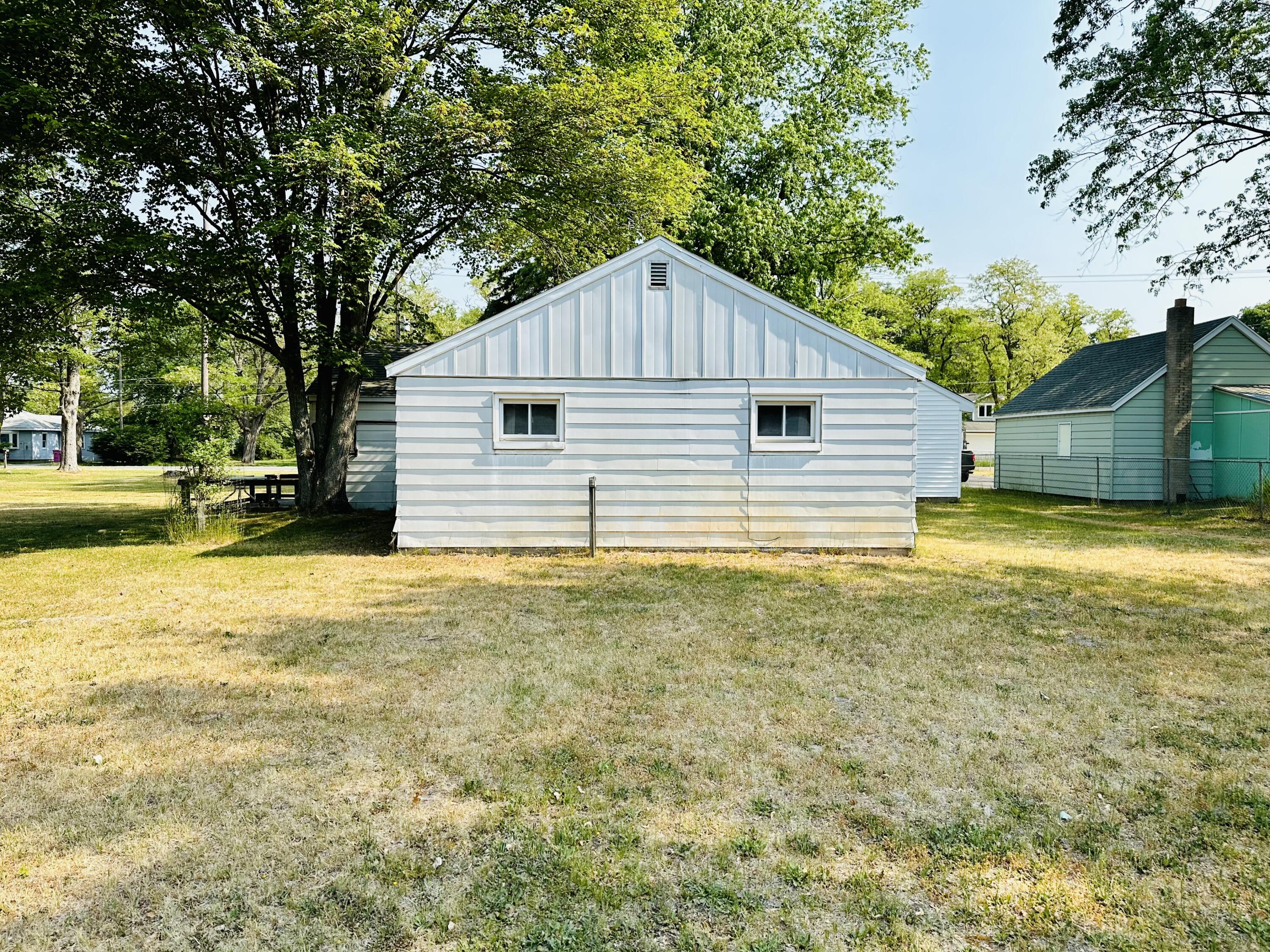 743 West Tyler Road Muskegon, MI 49445 - Photo 3 of 19 Photo Jun 08 2023, 10 21 00 AM