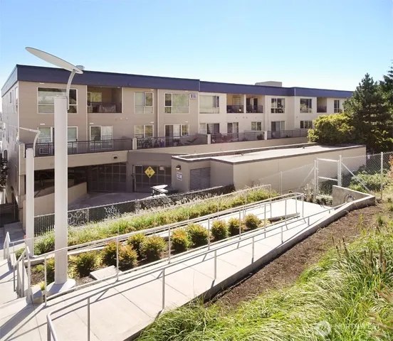 a front view of a house with a swimming pool