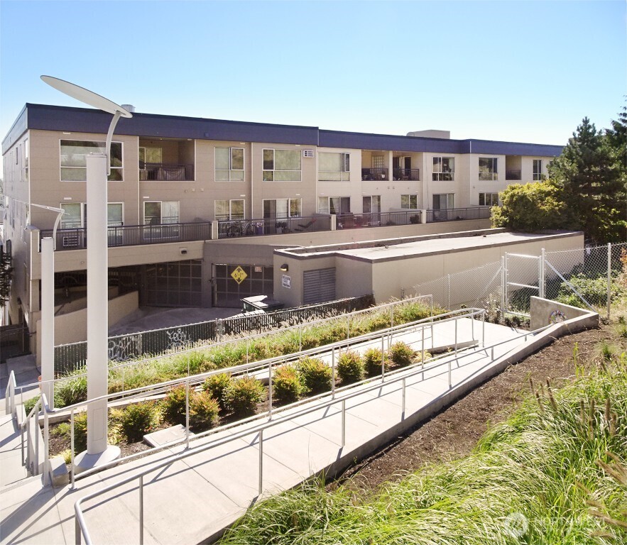 a front view of a house with a swimming pool