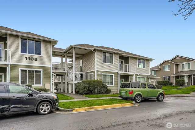 a car parked in front of a house