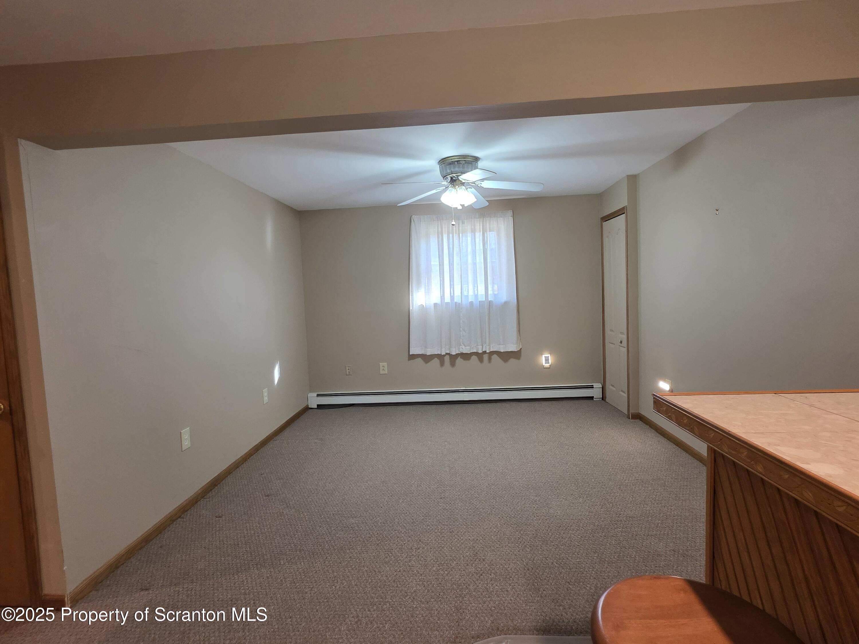 129 Northpoint Drive Olyphant, PA 18447 - Photo 38 of 56 a view of an empty room with a window