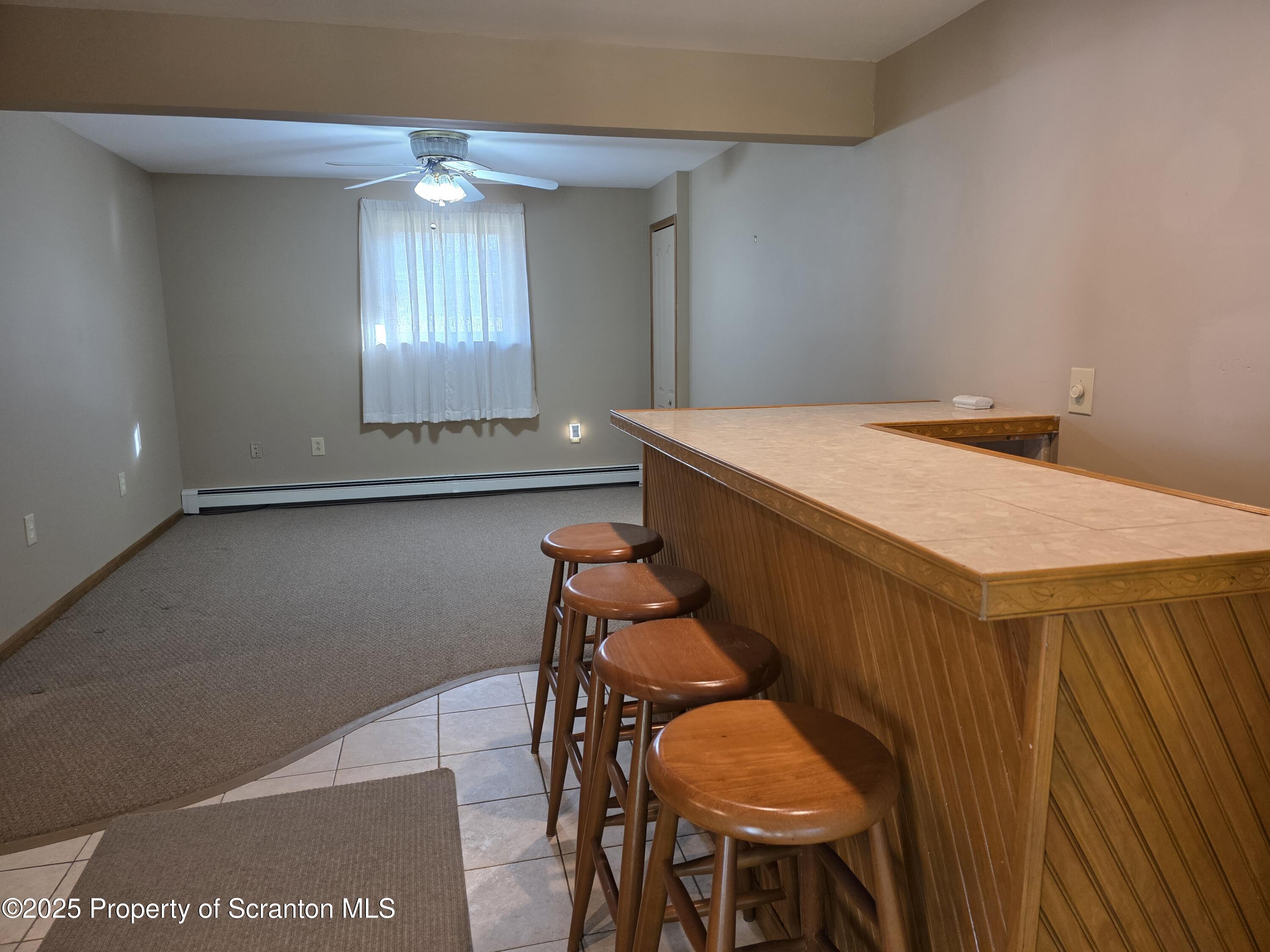 129 Northpoint Drive Olyphant, PA 18447 - Photo 42 of 56 a room with furniture and window