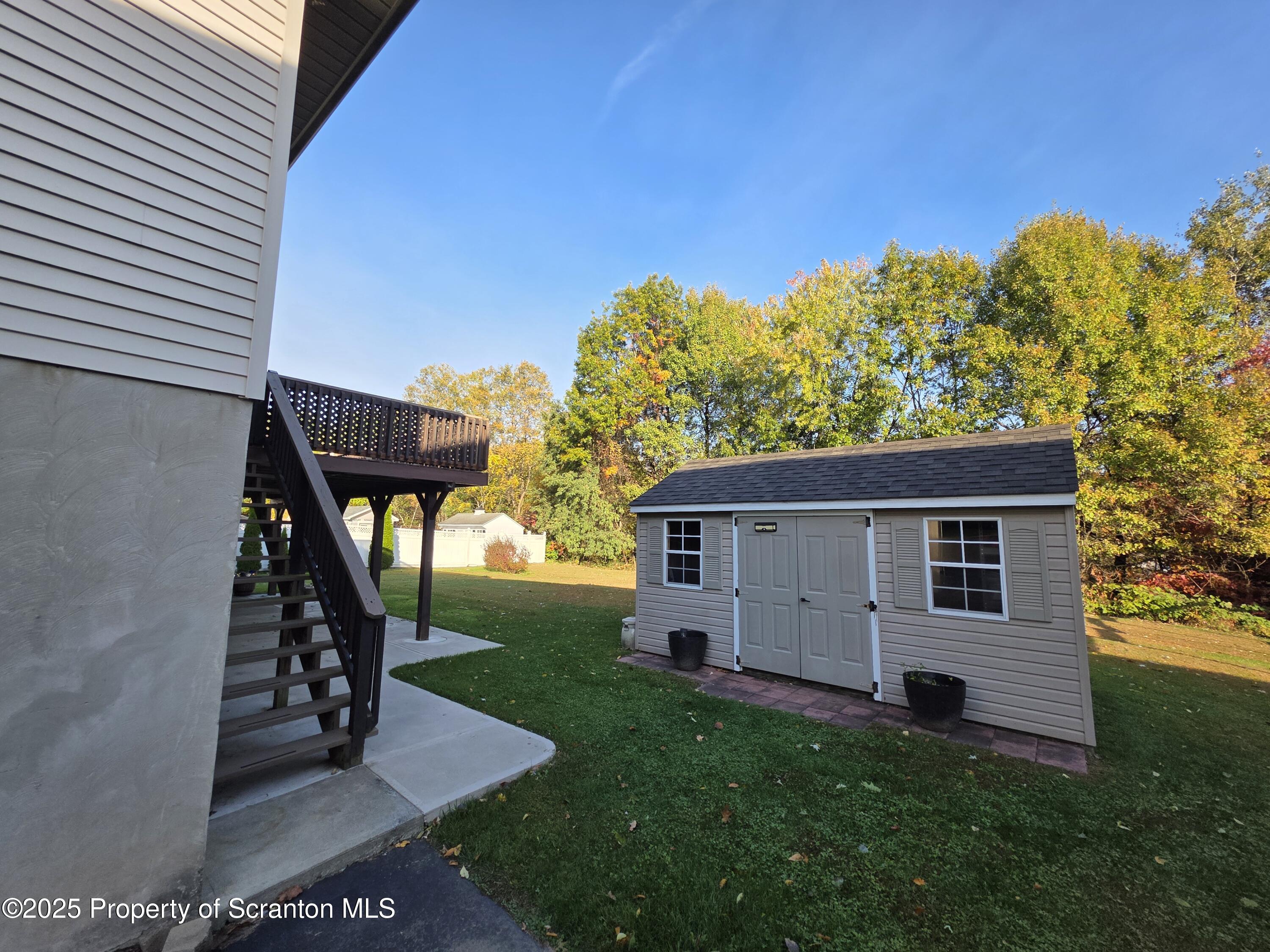 129 Northpoint Drive Olyphant, PA 18447 - Photo 55 of 56 a view of a house with a yard