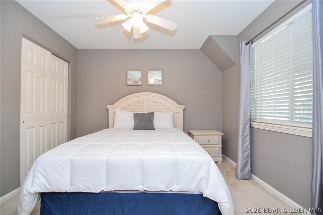 194 Sac Road, Unit D301 Sunrise Beach, MO 65079 - Photo 27 of 43 Guest bedroom near entry of condo