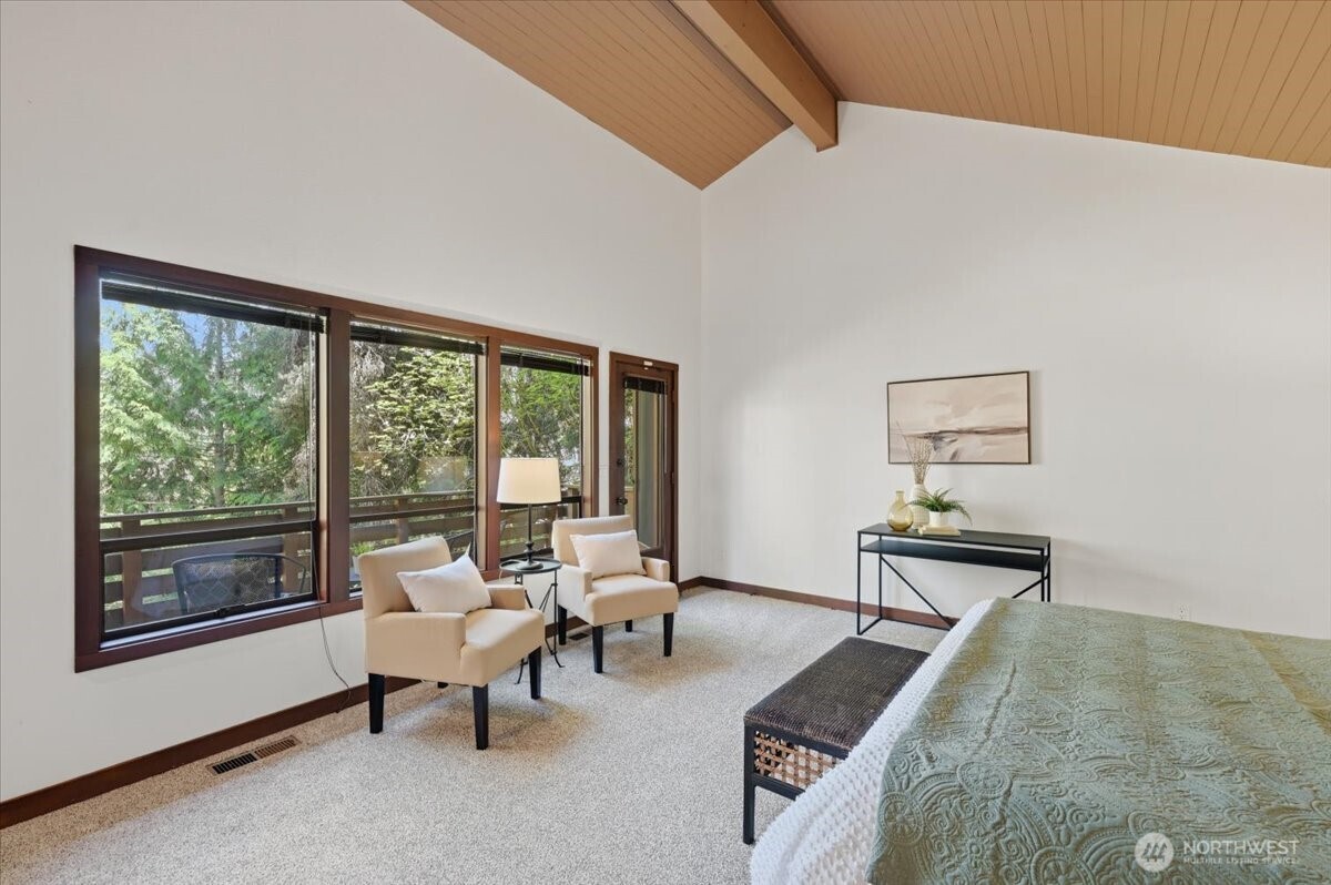 9418 Odin Way Bothell, WA 98011 - Photo 18 of 39 a living room with furniture and a window