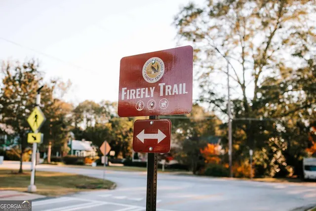 a street sign on a pole on a street