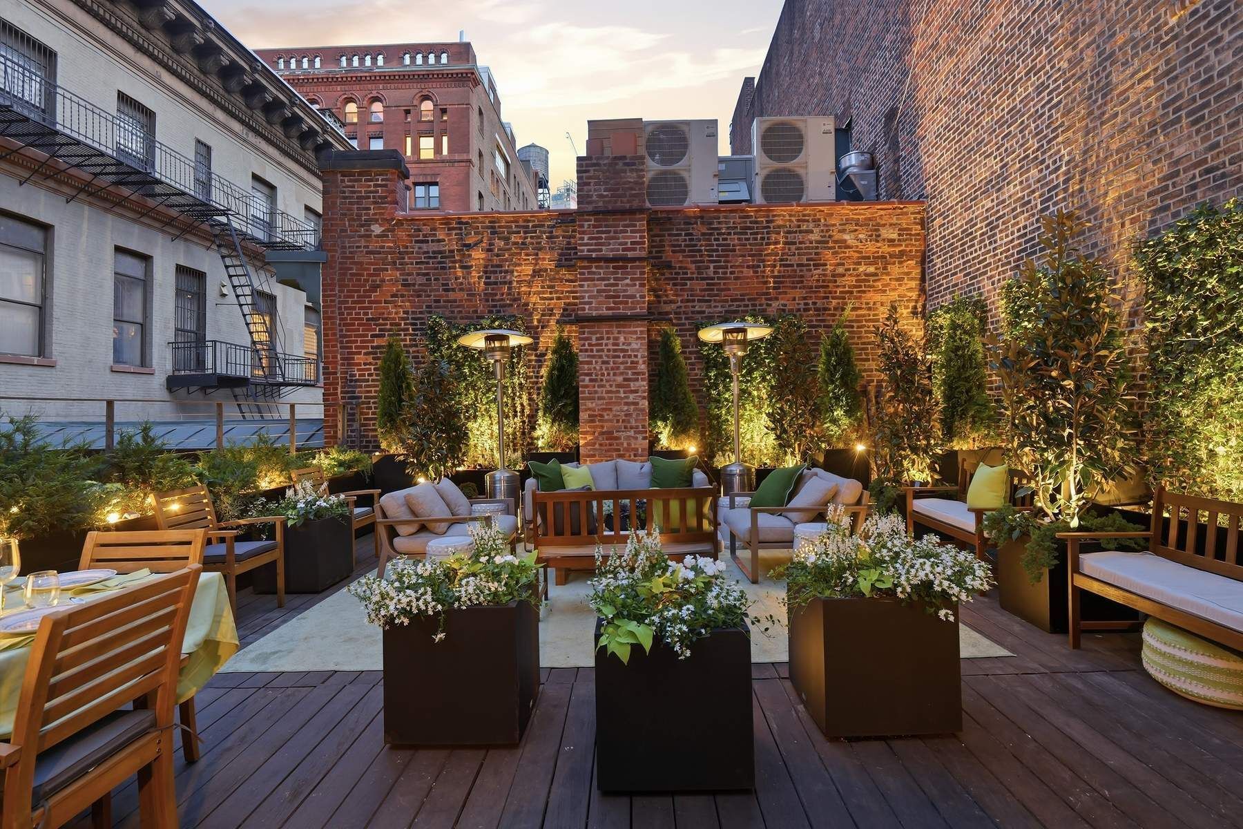 4 Staple Street Manhattan, NY 10013 - Photo 5 of 29 a view of a patio with couches and potted plants