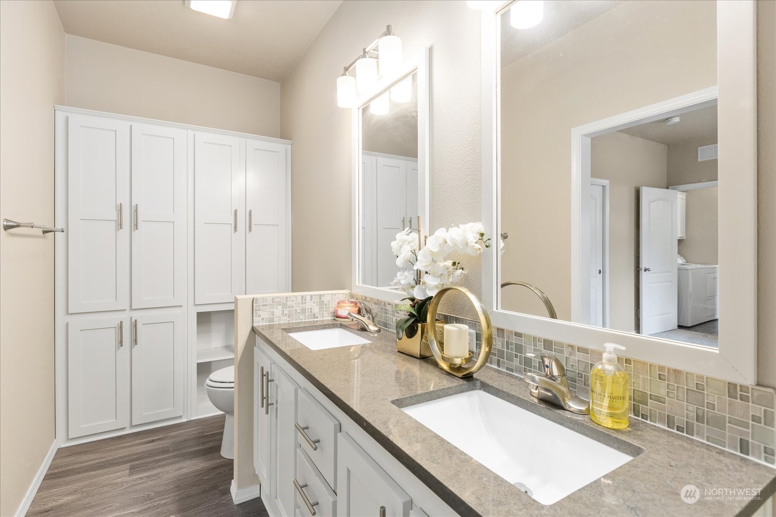 2101 South 324th Street, Unit 176 Federal Way, WA 98003 - Photo 19 of 33 a room with a sink and cabinets