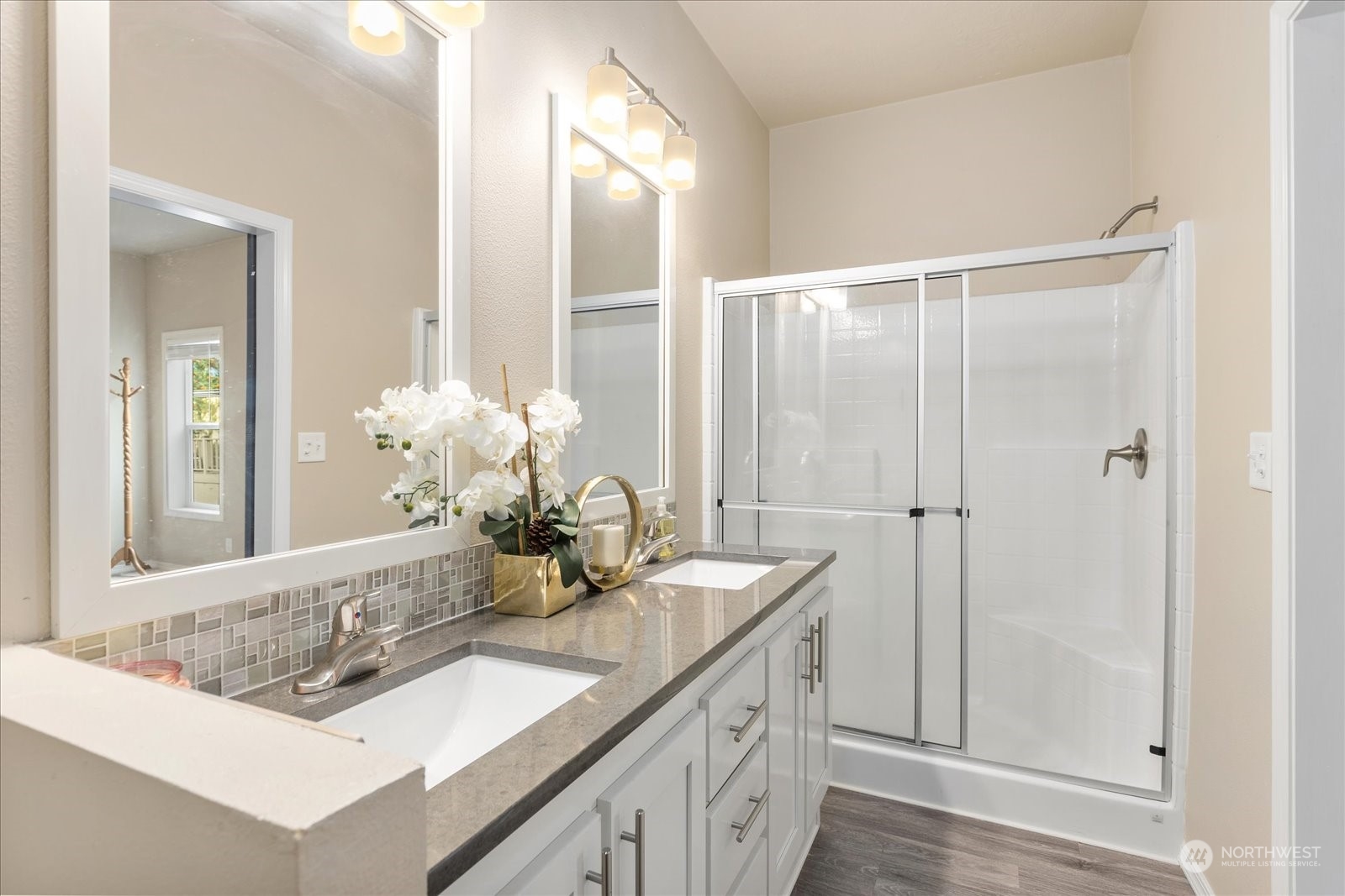 2101 South 324th Street, Unit 176 Federal Way, WA 98003 - Photo 20 of 33 a bathroom with a sink a vanity and a mirror