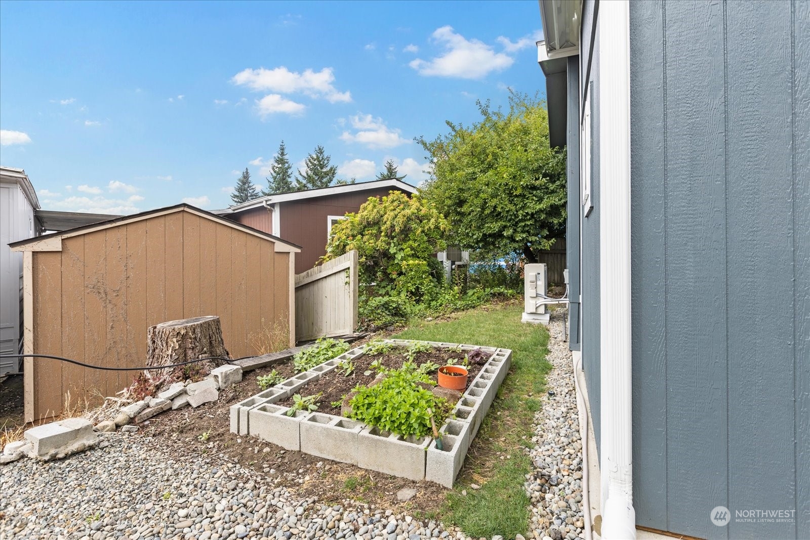 2101 South 324th Street, Unit 176 Federal Way, WA 98003 - Photo 24 of 33 a view of a backyard