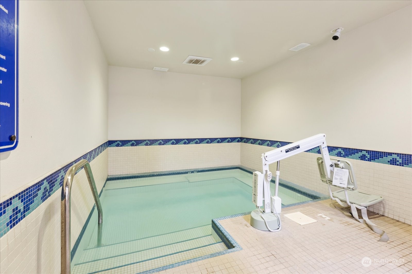 2101 South 324th Street, Unit 176 Federal Way, WA 98003 - Photo 29 of 33 a view of a room with wooden floor and windows