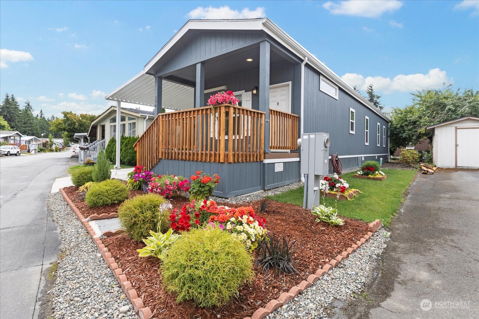 2101 South 324th Street, Unit 176 Federal Way, WA 98003 - Photo 3 of 33 a front view of house with yard