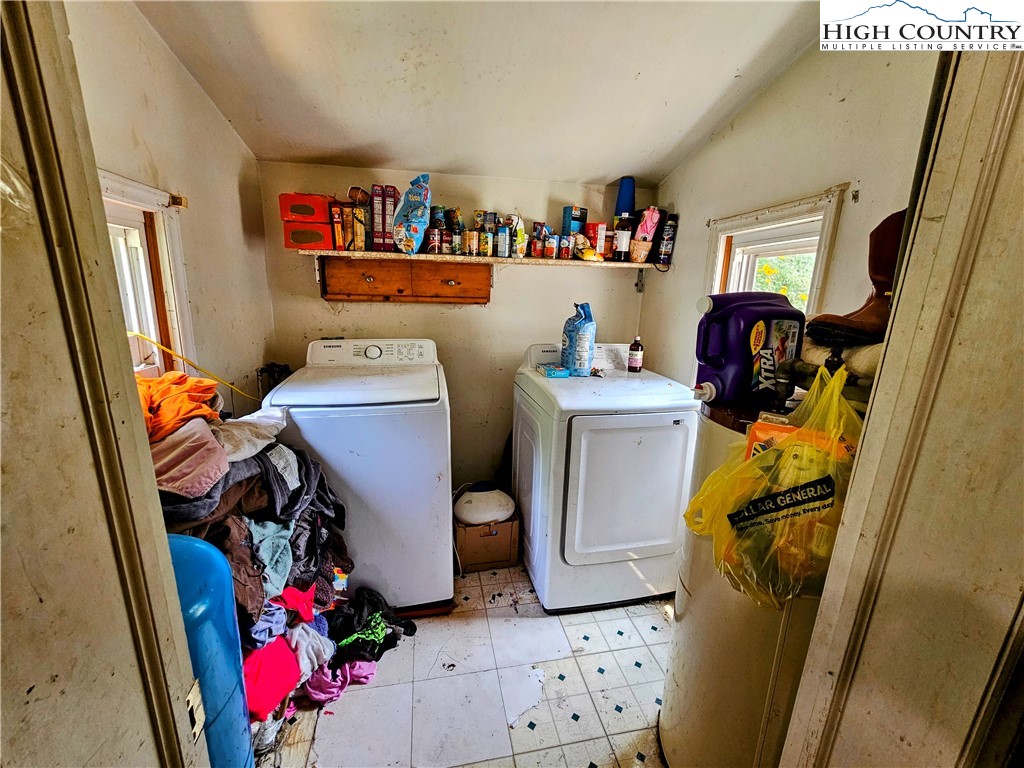 785 West Deep Ford Road Lansing, NC 28643 - Photo 13 of 21 a utility room with dryer and washer