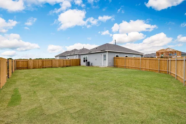a view of a house with a garden