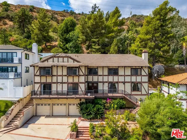 aerial view of a large house with a large windows