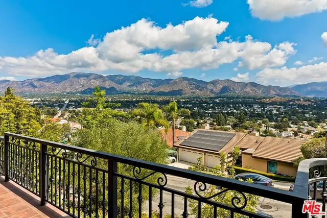 a view of a city with an ocean