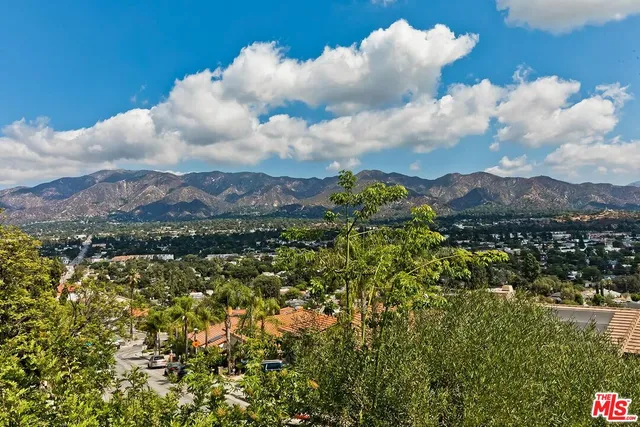 a view of a city and mountains