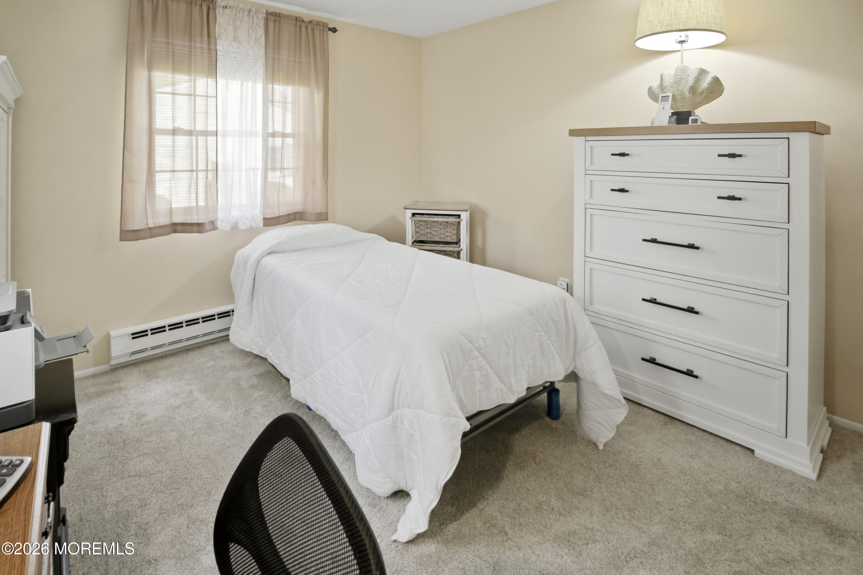 22 A Roosevelt City Road Whiting, NJ 08759 - Photo 10 of 18 a bed room with a bed and a window