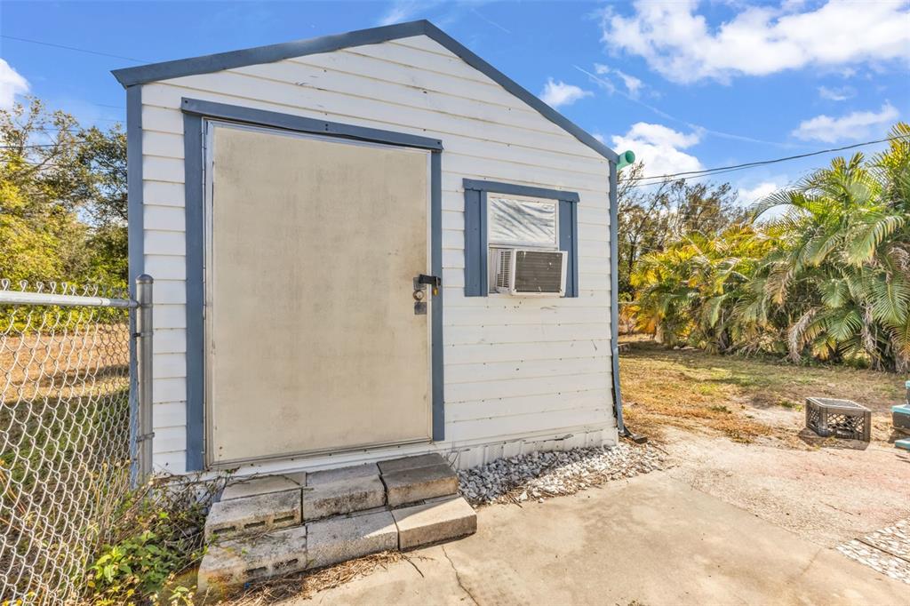 6128 Padula Street Punta Gorda, FL 33950 - Photo 19 of 24 a front view of a house