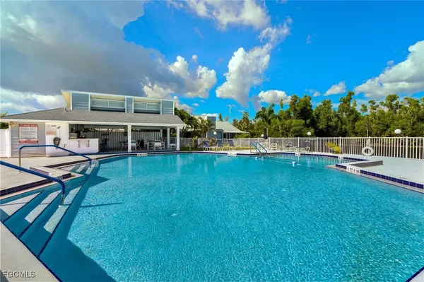 a view of a house with a swimming pool
