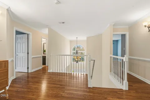 a bathroom with a toilet a sink and a mirror