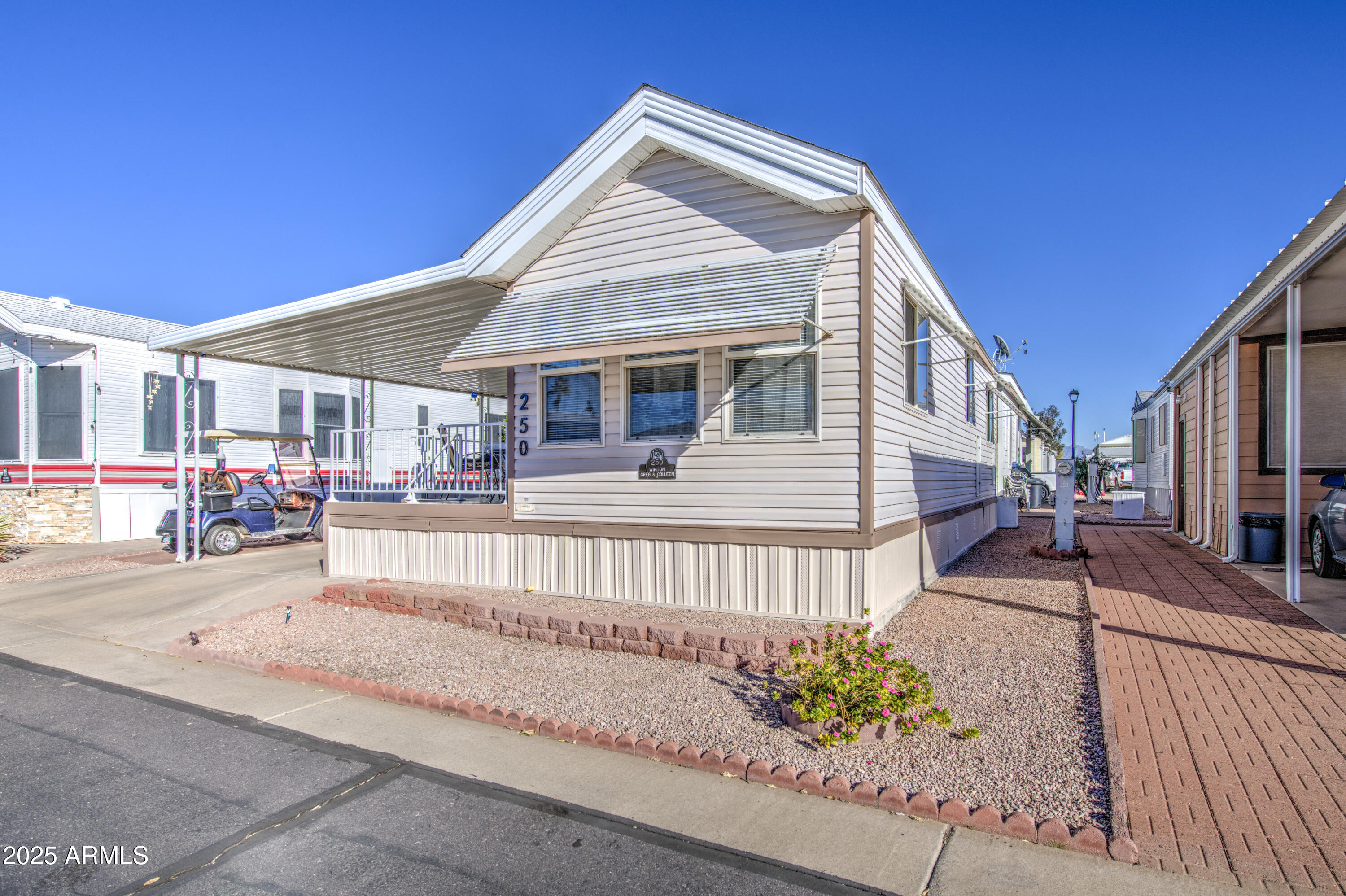 7750 East Broadway Road, Unit 250 Mesa, AZ 85208 - Photo 20 of 35 a front view of a house