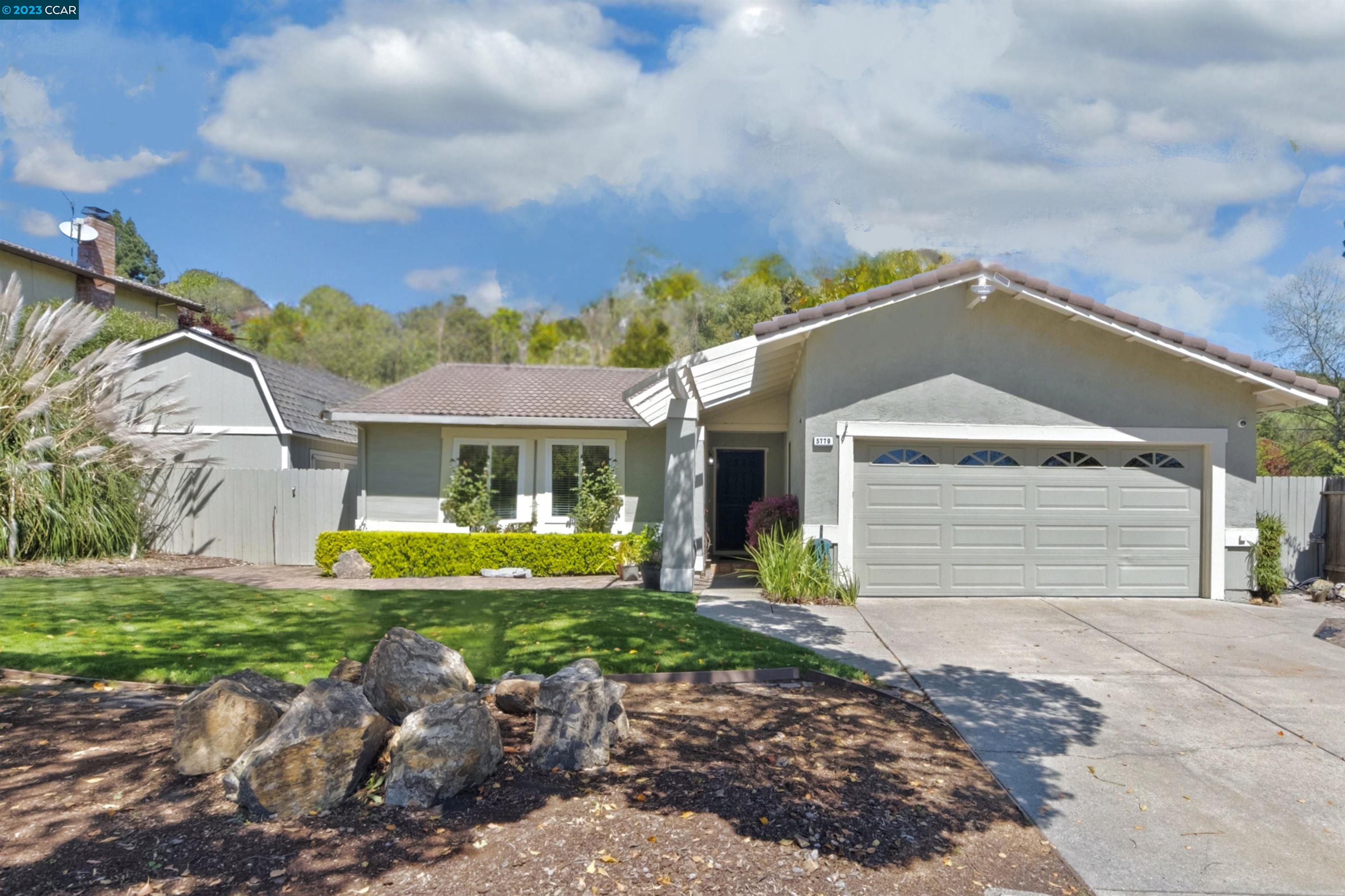 5779 Amend Road Richmond, CA 94803 - Photo 1 of 1 a front view of a house with garden