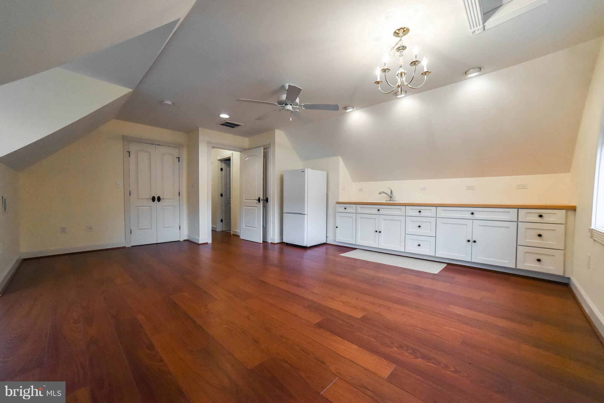 13521 Dowell Road Dowell, MD 20629 - Photo 14 of 30 Big upstrs rm with kitchenette and engineered hwd