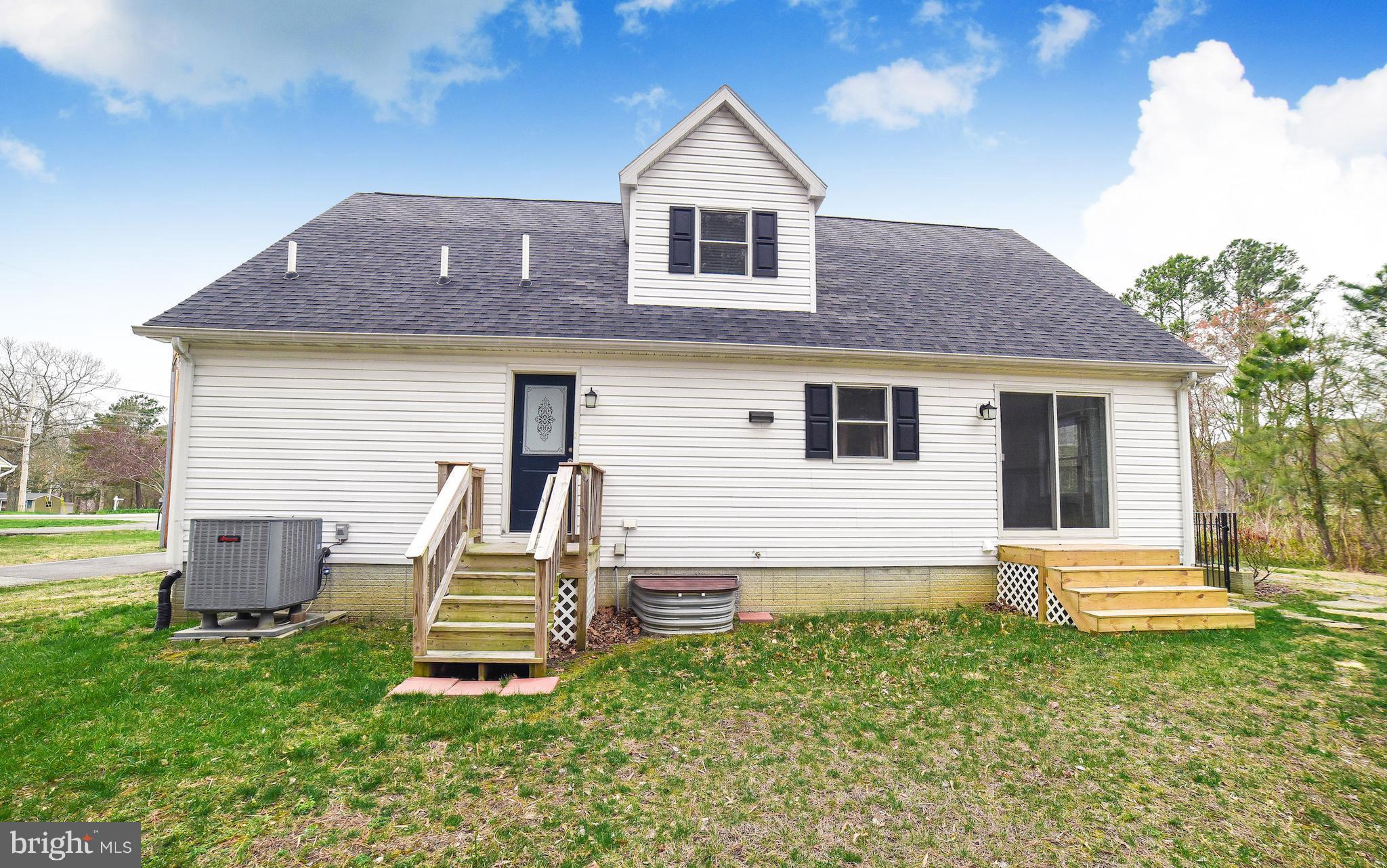 13521 Dowell Road Dowell, MD 20629 - Photo 26 of 30 Low-maintenance vinyl siding and new steps